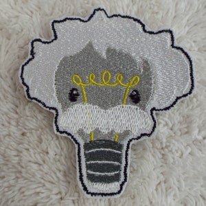May include: A white and grey embroidered patch of a lightbulb with a face. The lightbulb has a yellow filament and black eyes. The lightbulb is surrounded by a white cloud.