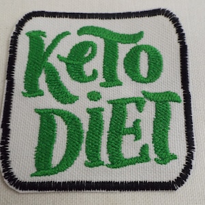 May include: Green embroidered patch with black stitching, featuring the text "Keto Diet" in a stylized font.