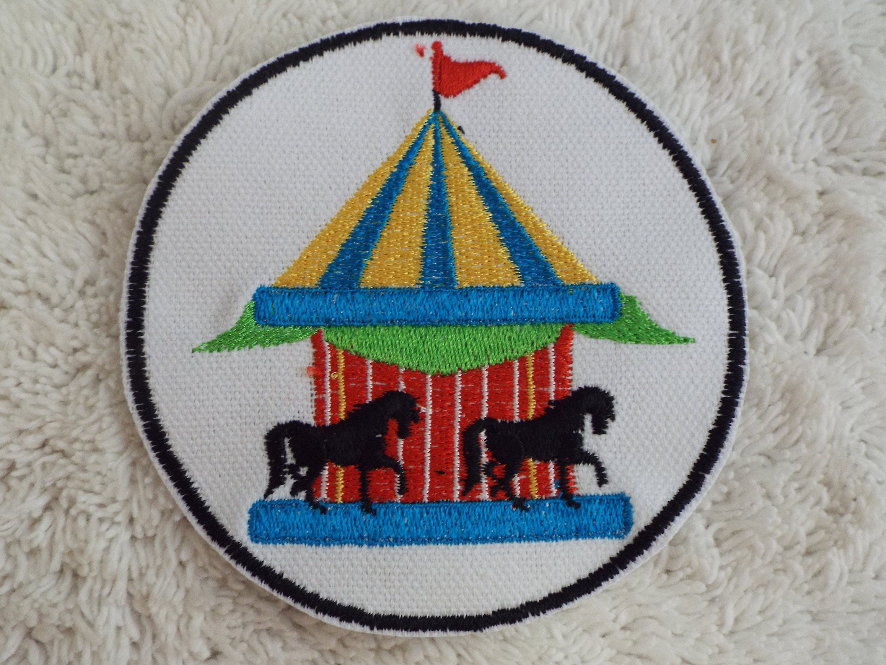 Kids On Round Carousel With Horses. Children Ride Merry-go-round In - Foto 12