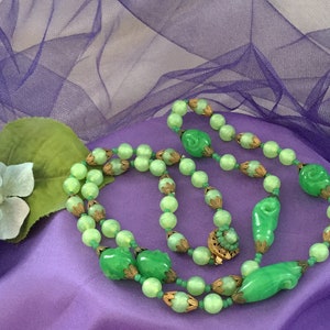 Miriam Haskell Two Toned Glass Jade Green Necklace. 31 inches Total Length, Hangs 15 inches. Beautiful Gilt Findings. Great Condition.