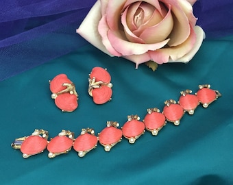 Coral Colored Bracelet and Earring Set from the 50’s.  Shell Motif made of Vintage Plastic with Pearls.