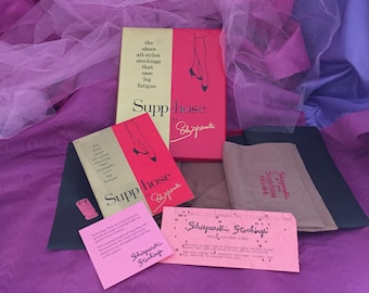 Two Pair Schiaparelli Stockings. New in Box Supp-Hose. Box, Promotional Booklet, Stock Card, Original Price Tag. One Pair Silver Color.