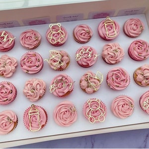 Pink and gold baby shower sale cupcakes