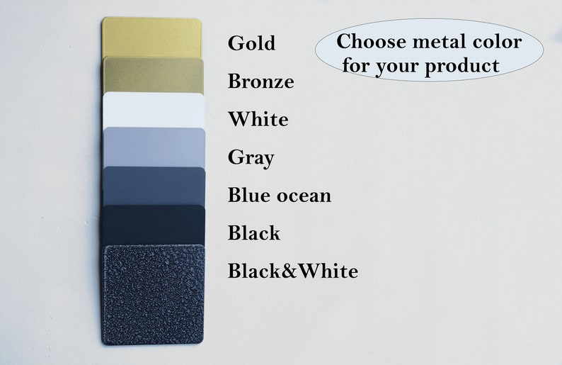 May include: A color palette featuring samples of metal finishes: gold, bronze, white, gray, blue ocean, black, and black and white. Text above the samples reads "Choose metal color for your product."