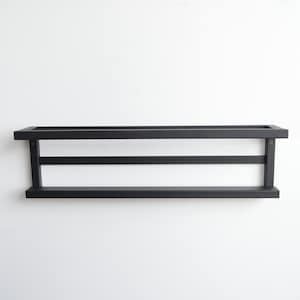 May include: A black, rectangular wall shelf with a minimalist design. The shelf has a flat base, a top frame, and two horizontal supports. The shelf is mounted on a white wall.