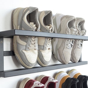 Wall mounted metal shoe rack Unique open floating shoe shelves Industrial entryway schuhregal for home decor Black custom hallway organizer