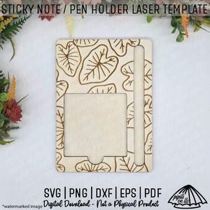 May include: A wooden sticky note and pen holder laser template. The design features a rectangular frame with a cutout for sticky notes and a slot for a pen. The surface is decorated with a leaf pattern. The text "STICKY NOTE / PEN HOLDER LASER TEMPLATE" is at the top.