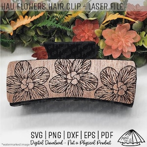 May include: A wooden hair clip with three etched flower designs. The clip is a light brown color with a black clasp. The text "HAU FLOWERS HAIR CLIP - LASER FILE" is at the top. The bottom of the image has the text "SVG | PNG | DXF | EPS | PDF".
