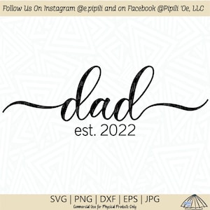 May include: Black and white cursive text that reads "dad est. 2022". The text is on a white background.