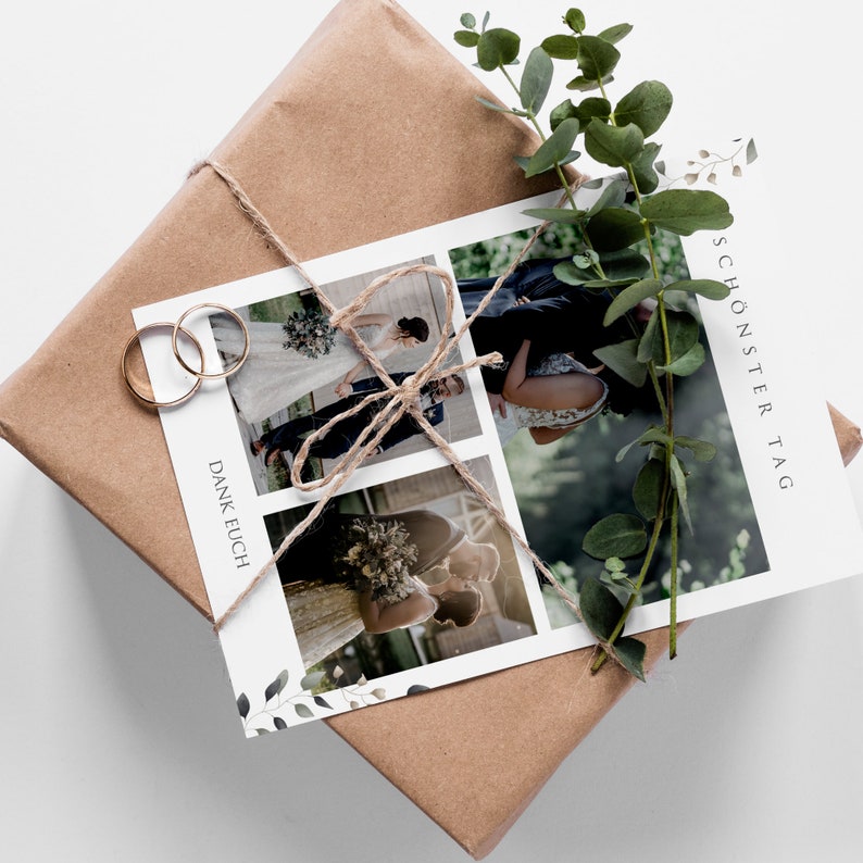 May include: A white card with three photos of a wedding couple. The card is tied with twine and has the text "SCH&Ouml;NSTERTAG" and "DANK EUCH" printed on it. The card is on top of a brown gift box with green leaves.
