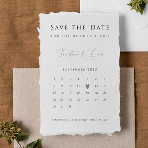 May include: Save the date card with a calendar for September 2023. The date September 19th is marked with a heart. The card says "Save the Date" and "For the wedding of Kerstin & Liam".