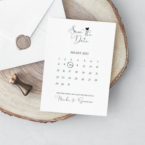 May include: Save the Date card with a calendar showing August 10th circled. The card has the text "Save the Date" with a heart and the names "Meike & Giovani" at the bottom.