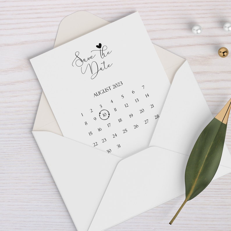 May include: A white card with the text "Save the Date" and a calendar with the date August 10, 2023 circled.