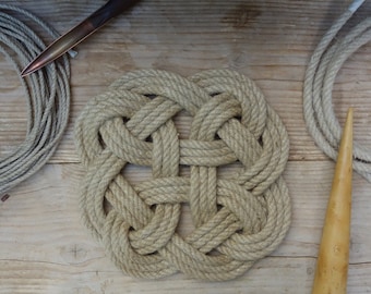 Handmade rope trivet in natural hemp rustic and authentic for nautical decoration