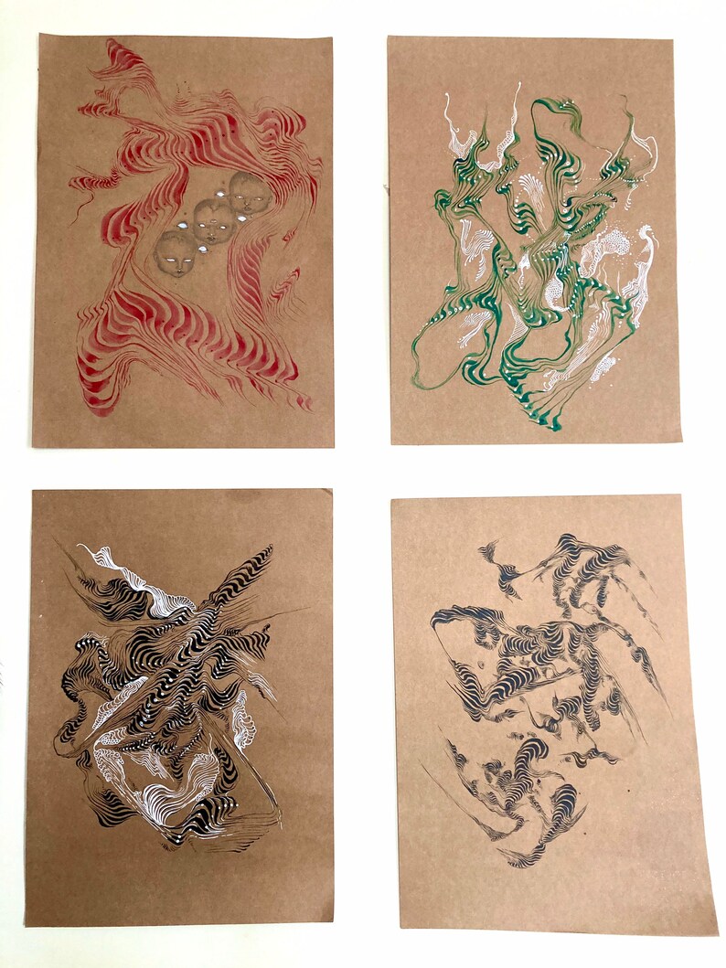 May include: Four abstract art pieces on brown paper. The first piece is red with white swirls and three faces. The second piece is green with white swirls. The third piece is black and white with swirls. The fourth piece is black and white with swirls.