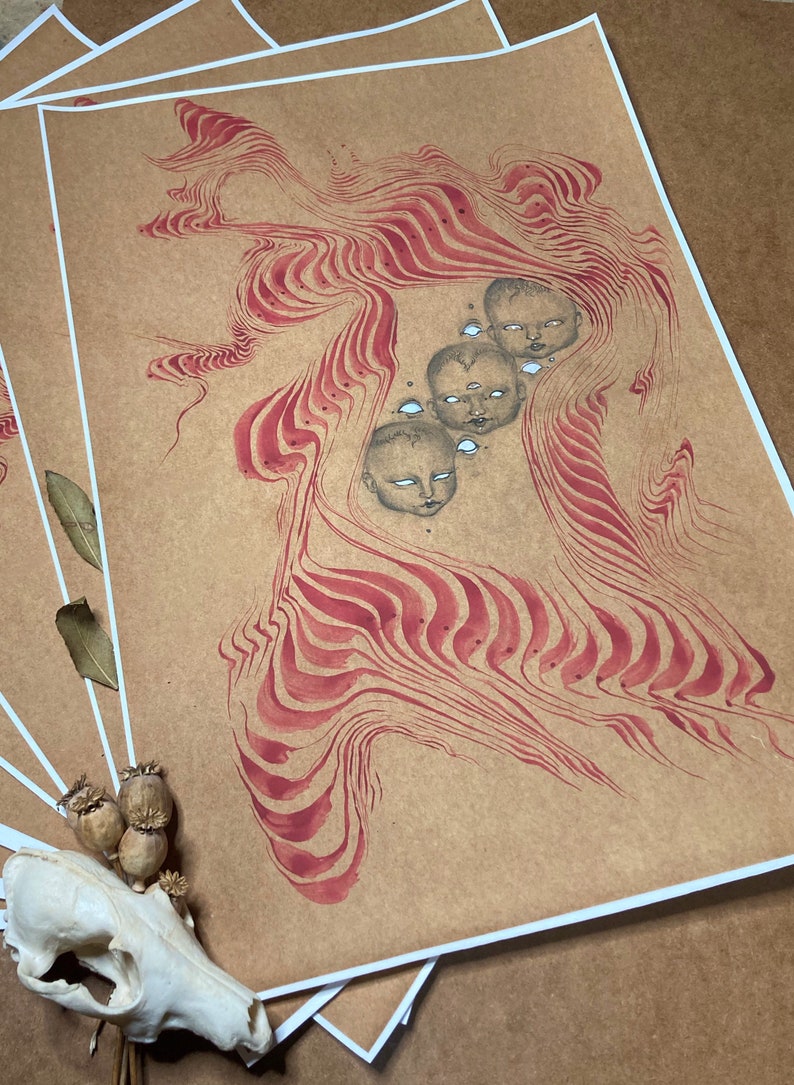 May include: A brown paper print with a red and white abstract design. The design features a series of swirling lines and shapes that resemble a flowing liquid. There are five small faces with white eyes and black pupils in the centre of the design.