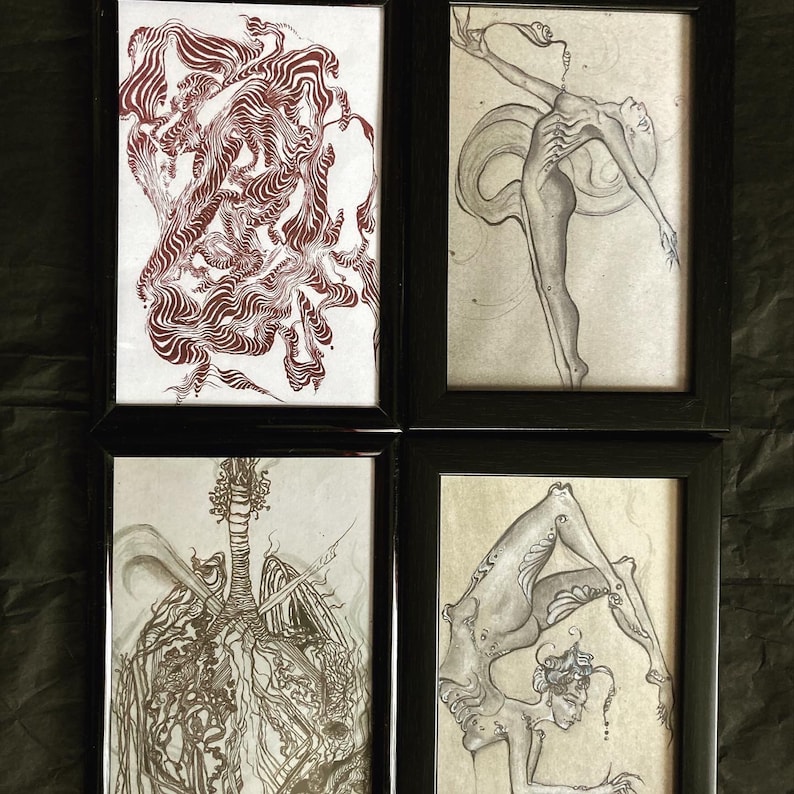 May include: Four framed black and white ink drawings. The top left drawing features a swirling pattern of lines. The top right drawing features a figure with long limbs and a long tail. The bottom left drawing features a swirling pattern of lines. The bottom right drawing features a figure with long limbs and a long tail.