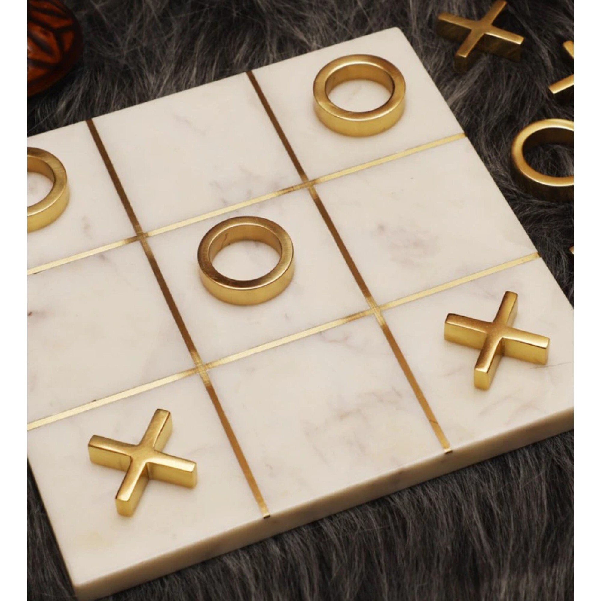 Strategy Tic-Tac-Toe Game With Brass Ornaments In A Wooden Box