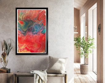 May include: Abstract painting with swirling red, gold, and blue colors in a black frame hanging on a wall in a modern living room.