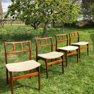 Mid Century Modern solid teak dining chairs by D Scan