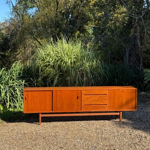 Vintage Mid Century Modern Teak Extra  Long Sideboard  by Swedish designer Nils Jonsson for Troeds 1960.