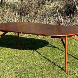 Mid century modern Danish teak extending dining table