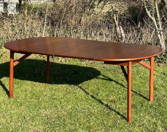 Mid century modern Danish teak extending dining table