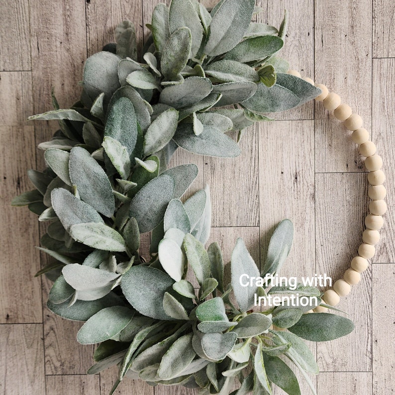 Minimalist hoop wreath. White beaded hoop wreath with lambs ear.