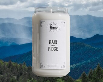 Rain on the Ridge all-natural soy candle in a 16oz reusable beer can glass. Paradise Tribute series