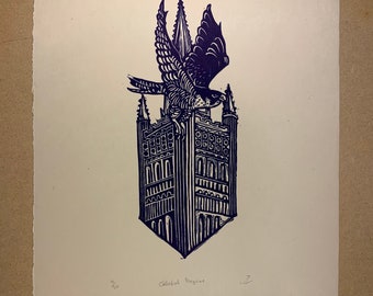 May include: A black and white linocut print of a cathedral with a peregrine falcon perched on top. The print is titled "Cathedral Peregrine" and numbered 3/50.