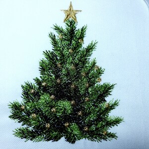 May include: Embroidered Christmas tree with a gold star on top and gold ornaments. The tree is green and the background is white.