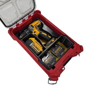 May include: A red and black tool case with a clear lid, containing a yellow and black cordless drill and several yellow and black battery packs. The case is open, revealing the tools inside.