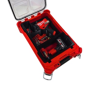 May include: Open red tool case with black interior compartments. The case contains a red and black drill, a battery, and various red drill bits. The brand name "Milwaukee" is visible on the drill. The case has a clear lid and a metal handle.