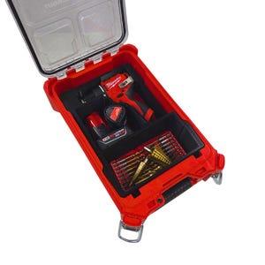 May include: Red tool case with a clear lid, containing a red and black drill, a battery, and a set of drill bits. The case has a handle and metal latches. The tools are neatly organized within the case.