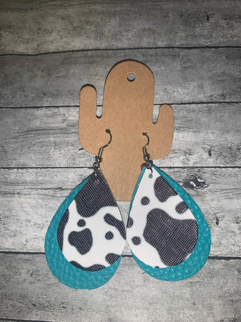cow print faux leather earrings