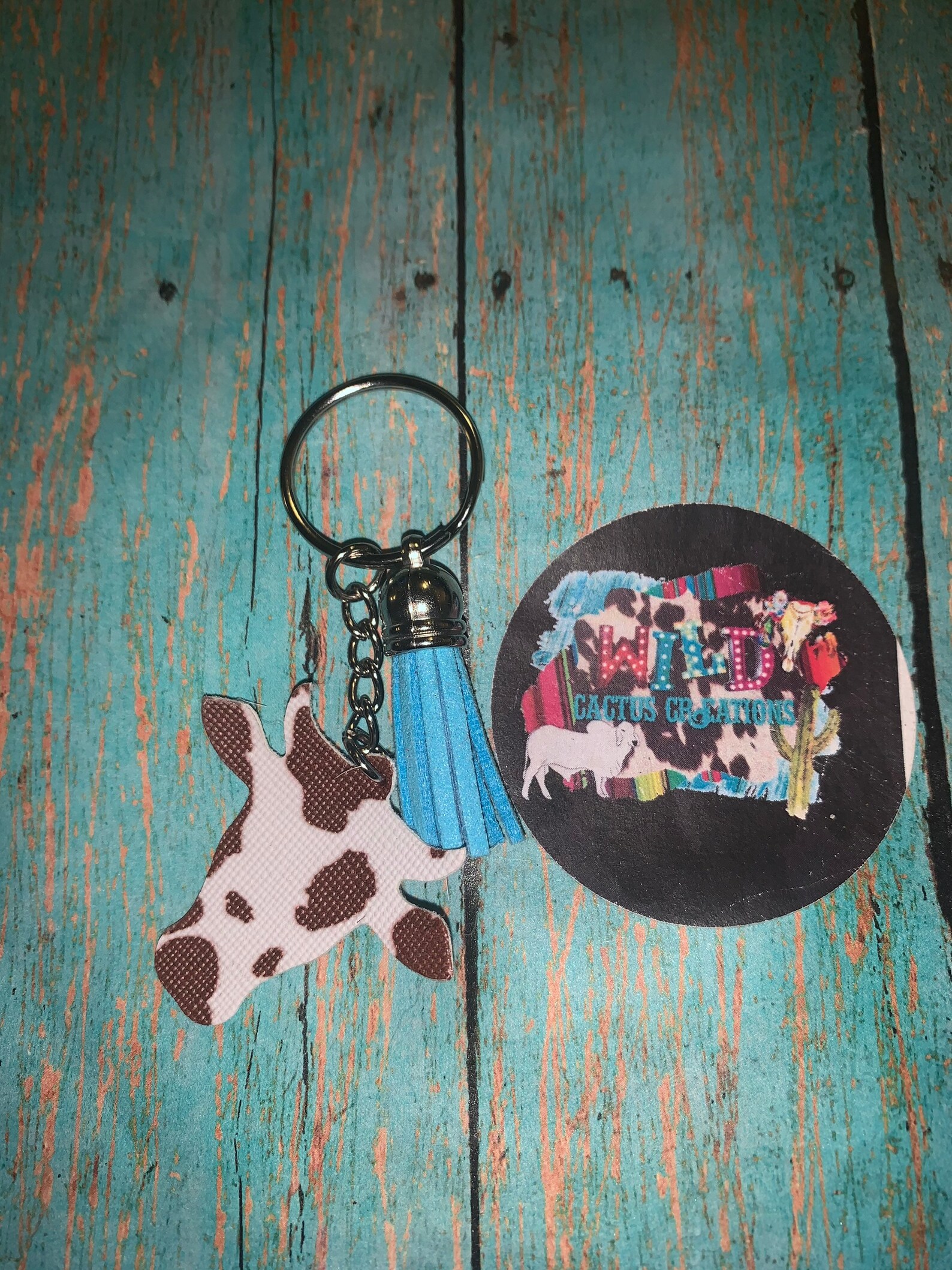 Cow print cow head faux leather keychain with turquoise tassel Etsy