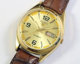 Vintage Seiko 5 automatisch Japan herenpolshorloge | gouden wijzerplaat tentoonstelling terug | dag datum | roestvrij staal | cadeau voor mannen voor hem a1028li22