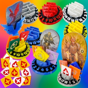 May include: A set of colorful, 3D printed game pieces with numbers and symbols. The pieces are designed to hold cards and tokens. The pieces are on a rainbow background.