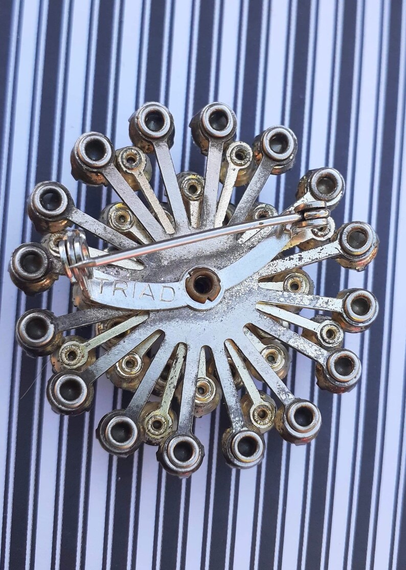 Vintage Signed Triad Starburst Brooch