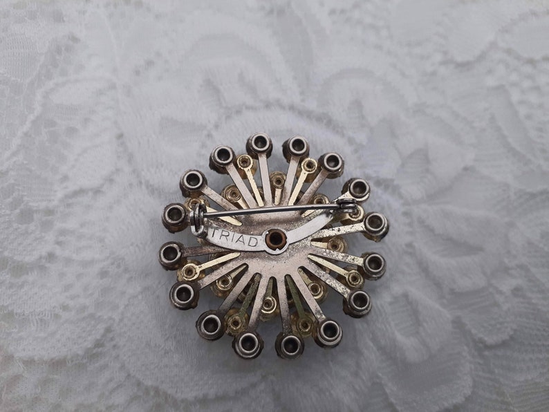 Vintage Signed Triad Starburst Brooch