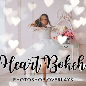 May include: A young girl wearing a white dress twirls in front of a pink background with heart-shaped bokeh. The text "Heart Bokeh Photoshop Overlays" is at the bottom of the image.