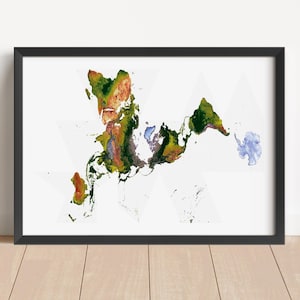 May include: A framed world map art print. The map features a colorful, abstract representation of the continents in shades of green, orange, and blue against a white background with geometric shapes. The frame is black.