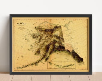 May include: A vintage map of Alaska with a relief-style depiction of the terrain. The map is framed in black and has a yellowed, aged appearance. The text "MAP OF ALASKA" is printed in the upper left corner.
