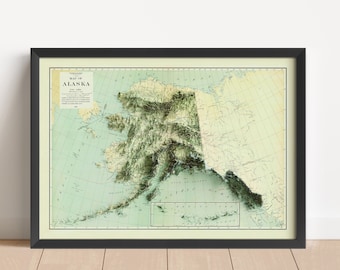 May include: A vintage map of Alaska with a relief-style depiction of the terrain. The map is framed in black and has a light green background with brown and green lines representing mountains and rivers. The title "Map of Alaska" is printed in black at the top of the map.
