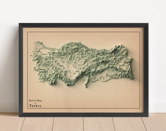 May include: A vintage relief map of Turkey, printed on cream-colored paper and framed in black. The map shows the country's topography with green shading for elevation.