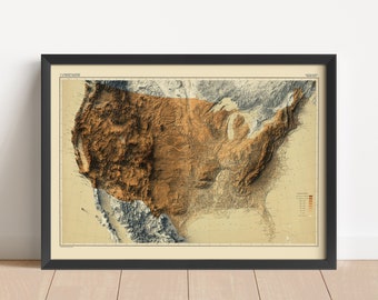 May include: Framed vintage map of the United States, showcasing a detailed relief of the country's topography. The map features a color palette of brown, beige, and blue, with a black frame. The map is a decorative piece.