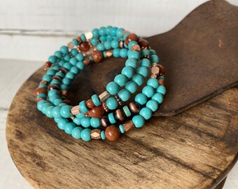 Handmade Stackable look Turquoise and goldtone multi wrap bracelet.