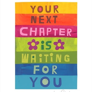 May include: A colorful art print with the text "YOUR NEXT CHAPTER is WAITING FOR YOU." The design features horizontal stripes in shades of yellow, orange, pink, green, blue, and turquoise. Two purple flowers are included in the design.