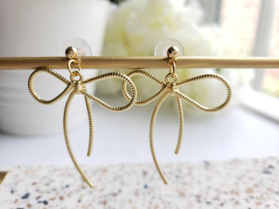 ピアス Tie a Pearl ribbon Earrings il_1080xN.3008278175_9aal.jpg