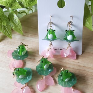 Frog on lily pad earrings,  Frog and floral petals Lovely drop earrings